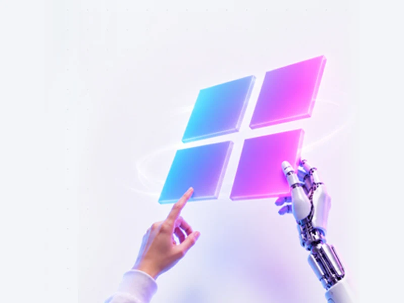 Grafik für Damalo: gläsernes Microsoft-Logo zwischen einer Hand und einer Roboterhand, links oben das Damalo-Logo